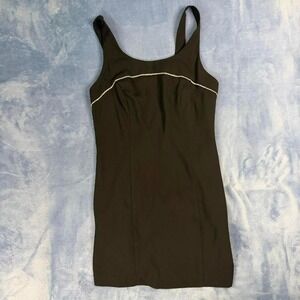 Vintage onyx nite Black bodycon mini dress with white trim. Size: 10